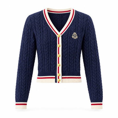 Women's cropped cable knit cardigan in navy blue on white background