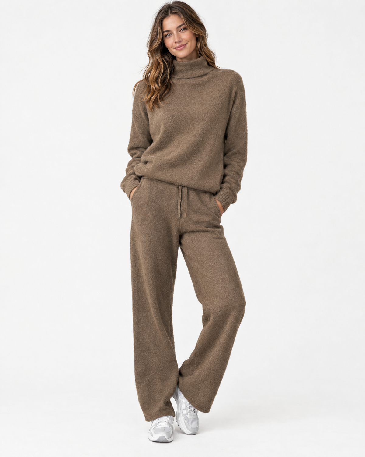 Woman wearing taupe two-piece turtleneck knit set