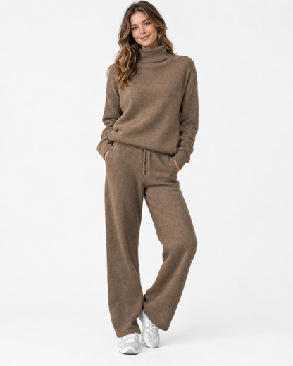 Woman wearing taupe two-piece turtleneck knit set